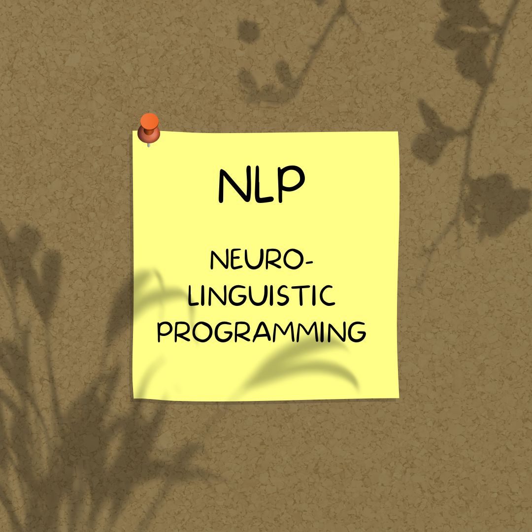 Yellow sticky note with the letters NLP written on it, symbolizing Neuro-Linguistic Programming.